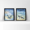 Framed watercolor painting set of flying cranes.