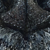 Zoomed in view of a watercolor painting of a zoomed in perspective of a dog’s nose. The painting is in black and white.